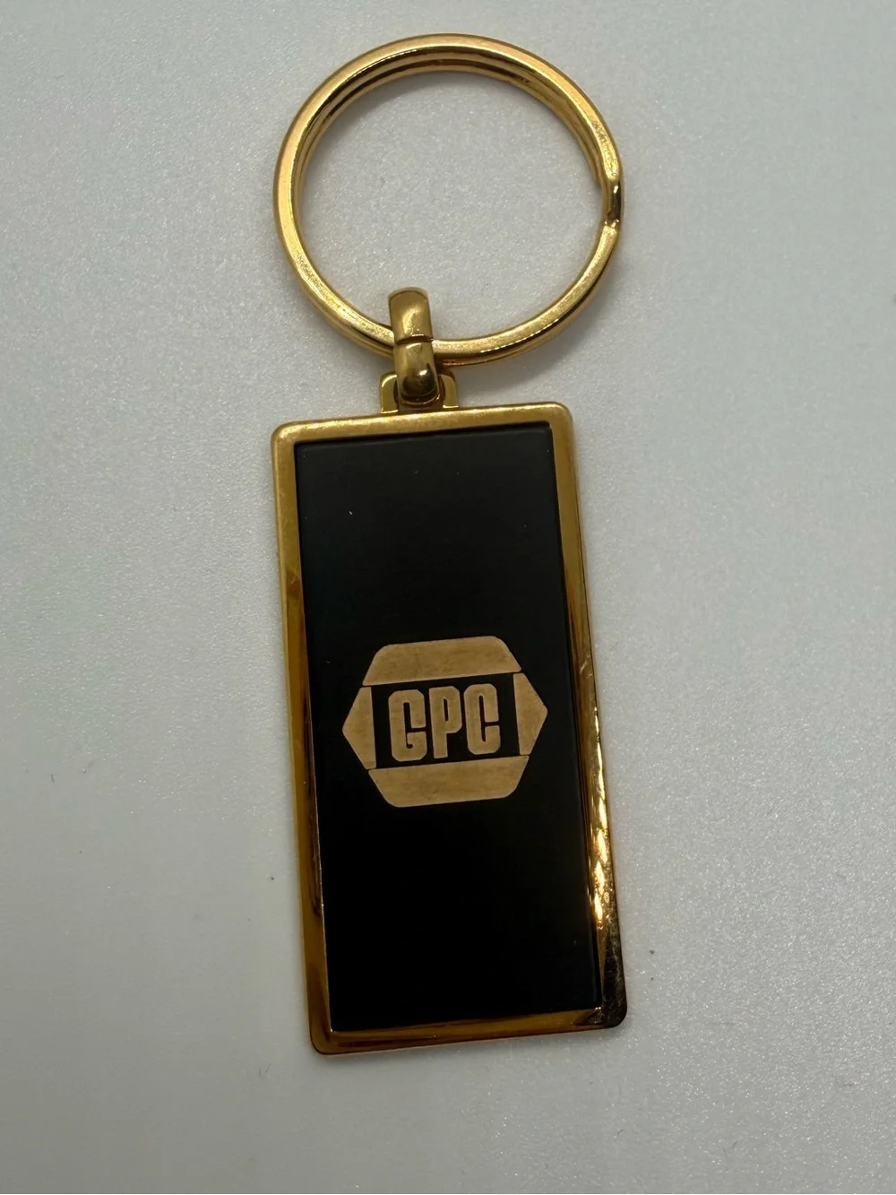 Vintage 1990 GPC Quota Maker Gold Tone Enamel Keychain